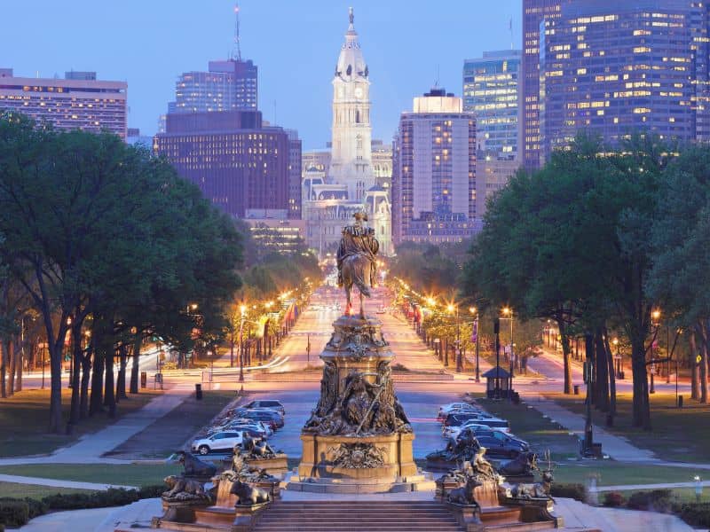 View of Philadelphia skyline with City Hall and Benjamin Franklin Parkway, representing land surveying and development services in Philadelphia